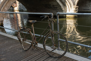 
Rusty old bike fished out of the river Dyle in Mechelen, Belgium