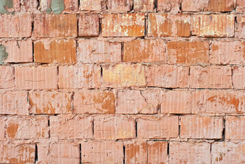 Texture of brick wall. Samples of wall or fence are presented at exhibitions. Orange brick close up.