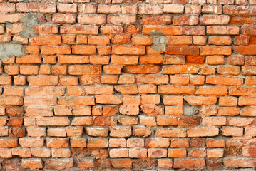 Texture of brick wall. Samples of wall or fence are presented at exhibitions. Orange brick close up.