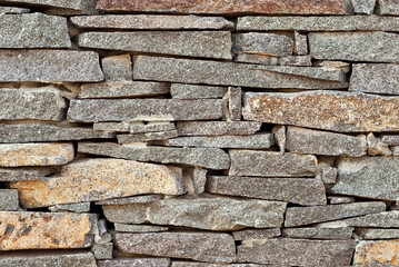 Texture of brick wall and concrete blocks. Samples of stone plates stacked evenly in a row.