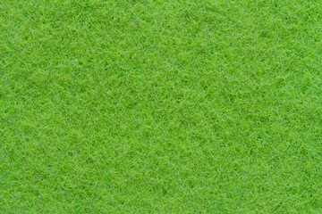 Obraz na płótnie Canvas Texture of the plastic sponge for washing the dishes