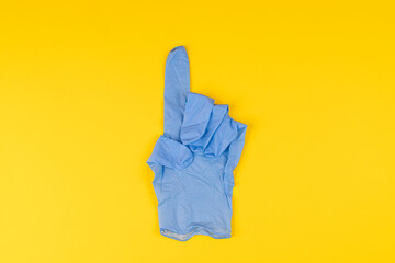 Blue latex glove  gesture