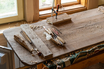 Carpenter working table  in a studio with vice and chisels