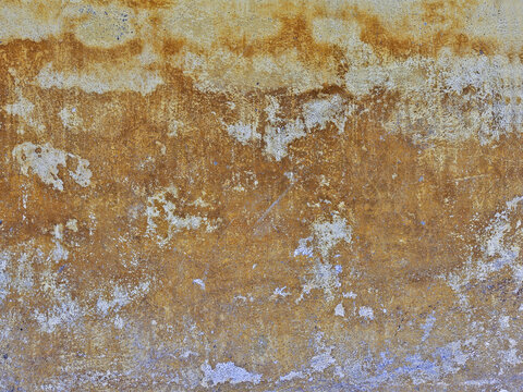 Shot of a rusty iron surface unevenly coated with the shades of brown.