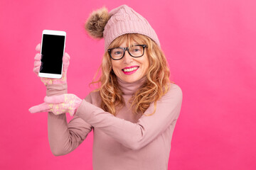 Fototapeta premium woman with mobile phone isolated on color background