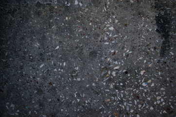 Old black grunge background. Concrete wall. Dark textured wallpaper. Grunge image.