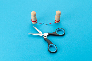 Family divorce. Breakup concept, help in family relationships. Two figures of people with hatred on...