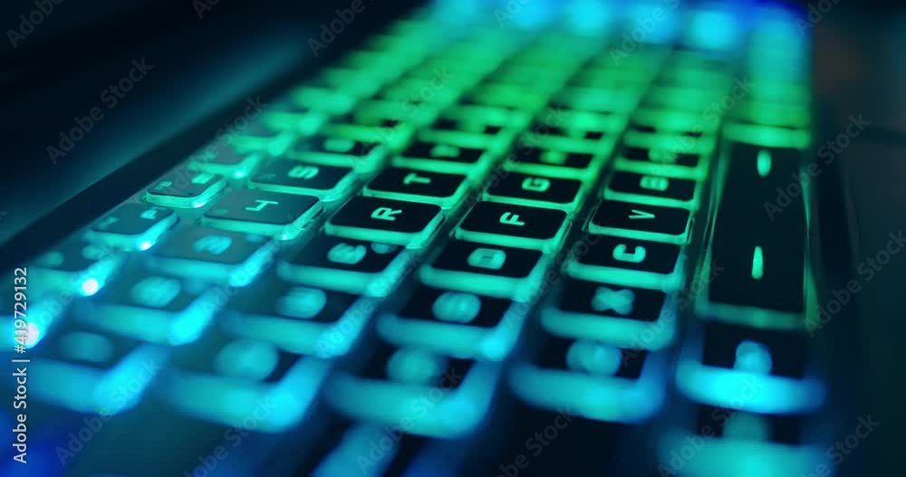 Wall mural close up of professional gaming keyboard with colorful led backlight in multiple colors. technology 