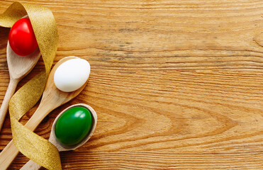 Easter eggs as the color of the Italian flag - green, white, red. Happy Easter holiday card