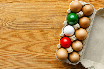 Easter eggs as the color of the Italian flag - green, white, red. Happy Easter holiday card