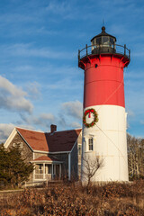 USA, Massachusetts, Cape Cod, Eastham. Nauset Light with Christmas wreath