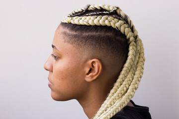 Young afro with blonde Box braids, African hair style also known as 