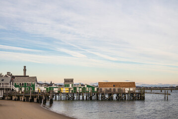 USA, Massachusetts, Cape Cod, Provincetown. Pier and Provincetown Monument.