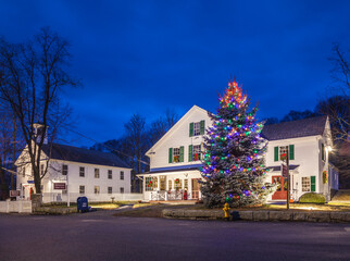 USA, Massachusetts, Cape Ann, Gloucester. Annisquam Village Hall with Christmas Tree at dusk.