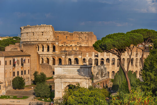 Italy, Rome, View of Colosseum and Arch of Titus