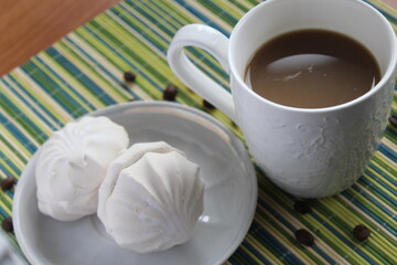 cup of coffee with marshmallows souffle delicious