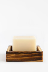 Bar of soap on wooden stand