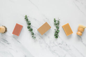 Natural bars of homemade soap on white background