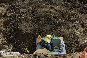 Assembling drainage system, rectangular drainage pipes holes on the concrete in the residential...