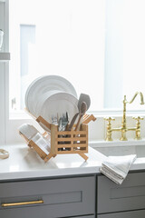 Fototapeta na wymiar Eco Friendly Bamboo Drying Rack in Modern Kitchen