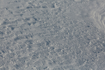 Snow texture. Snow surface background. Snow and ice.
