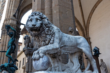 Beautiful statue of lion at famous Loggia dei Lanzi in Florence, Italy