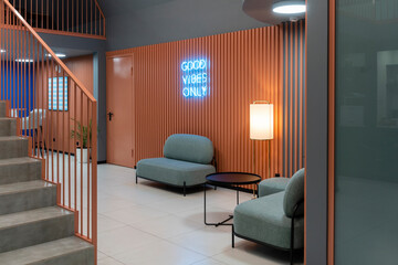 Interior of work place with illuminated blue light on western script