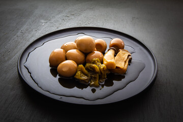 Korean food Braised Quail Eggs with pepper and mushrooms