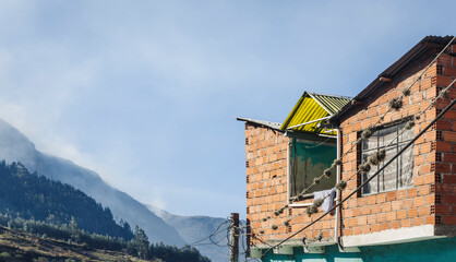 Facade of a precarious house  in the mountains of Quime, Bolivia. Yungas region of Bolivia.