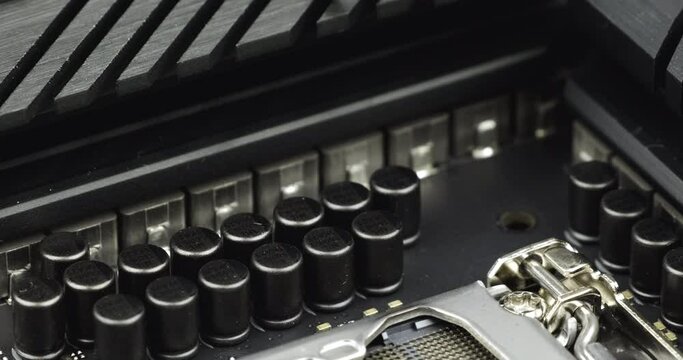Truck shot of CPU Processor Socket. Circuit board with capacity, Computer Motherboard with electronic capacity components device