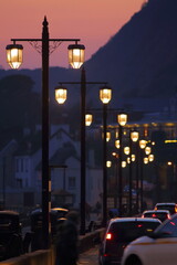Row of street lights at sunset  in town of Sidmouth, Devon