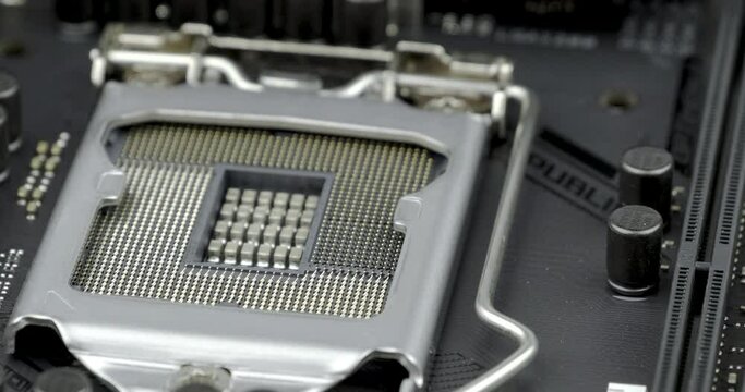 Truck shot of CPU Processor Socket. Circuit board with capacity, Computer Motherboard with electronic capacity components device
