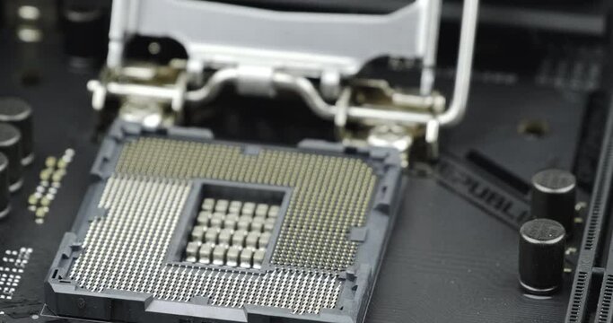 Truck shot of CPU Processor Socket. Circuit board with capacity, Computer Motherboard with electronic capacity components device