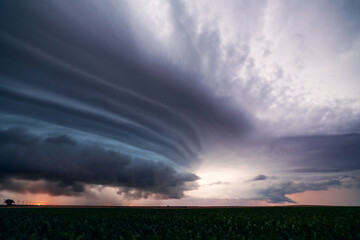 Naklejka na ściany i meble Supercell thunderstorm with dramatic storm clouds