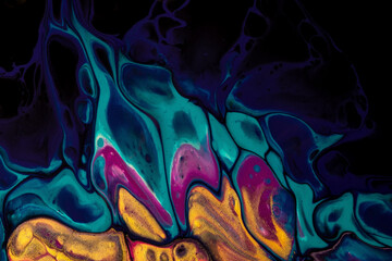 Bright abstract fluid art on black background dark purple and blue colors.