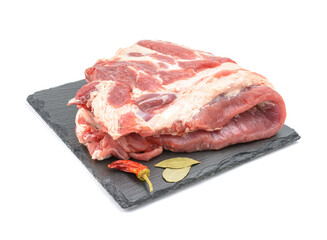 Raw pork ribs are isolated on a white background.