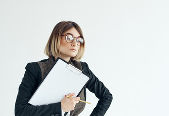 Woman download with documents in hands on a light background