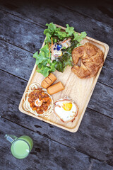 breakerfast set on the table , healthy food salads with  guava juice