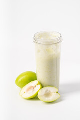 Healthy drink milk jujube smoothie on white background