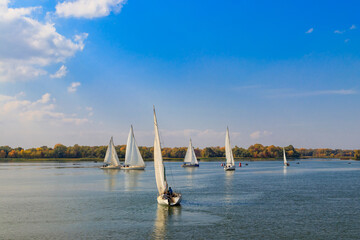 Fototapeta premium Yachts at sailing regatta on the Dnieper river in Kremenchug, Ukraine