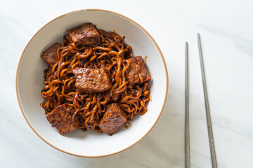 Jjapaguri or Chapaguri, Korean Black Beans Spicy Noodles with Beef