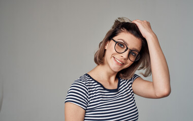 woman in striped t-shirt emotion smile glasses model