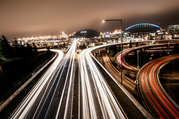 light trails from traffic in a foggy night in Seattle area
