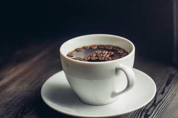 aromatic drink in cups coffee beans wooden table morning breakfast