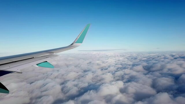 Airbus A319 Flying at Cruise Altitude above a Sea of Clouds