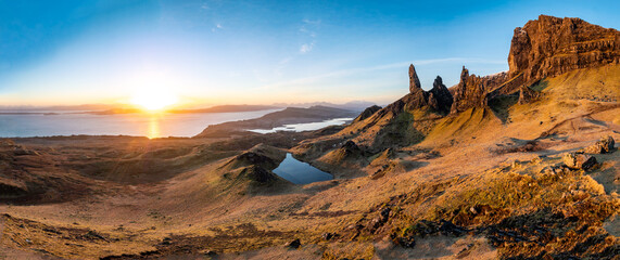  Old man of Storr rock in Isle of Skye. Panorama of popular rocks,