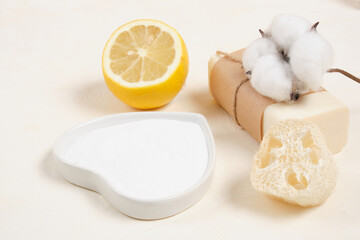 lemon, luffa, soap and baking soda for house keeping