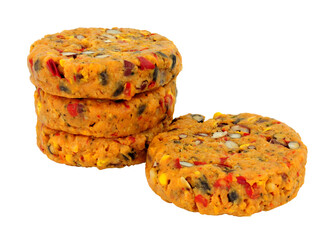 Raw gluten free vegan spicy bean burgers isolated on a white background