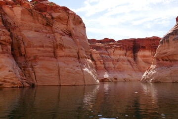 Fototapeta na wymiar View of narrow cliff canyon from a boat in Glen Canyon National Recreation Area, Lake Powell, Arizona