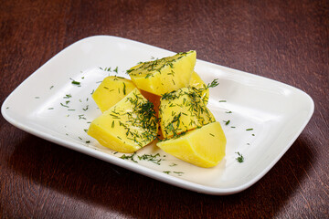 Boiled potato with green dill